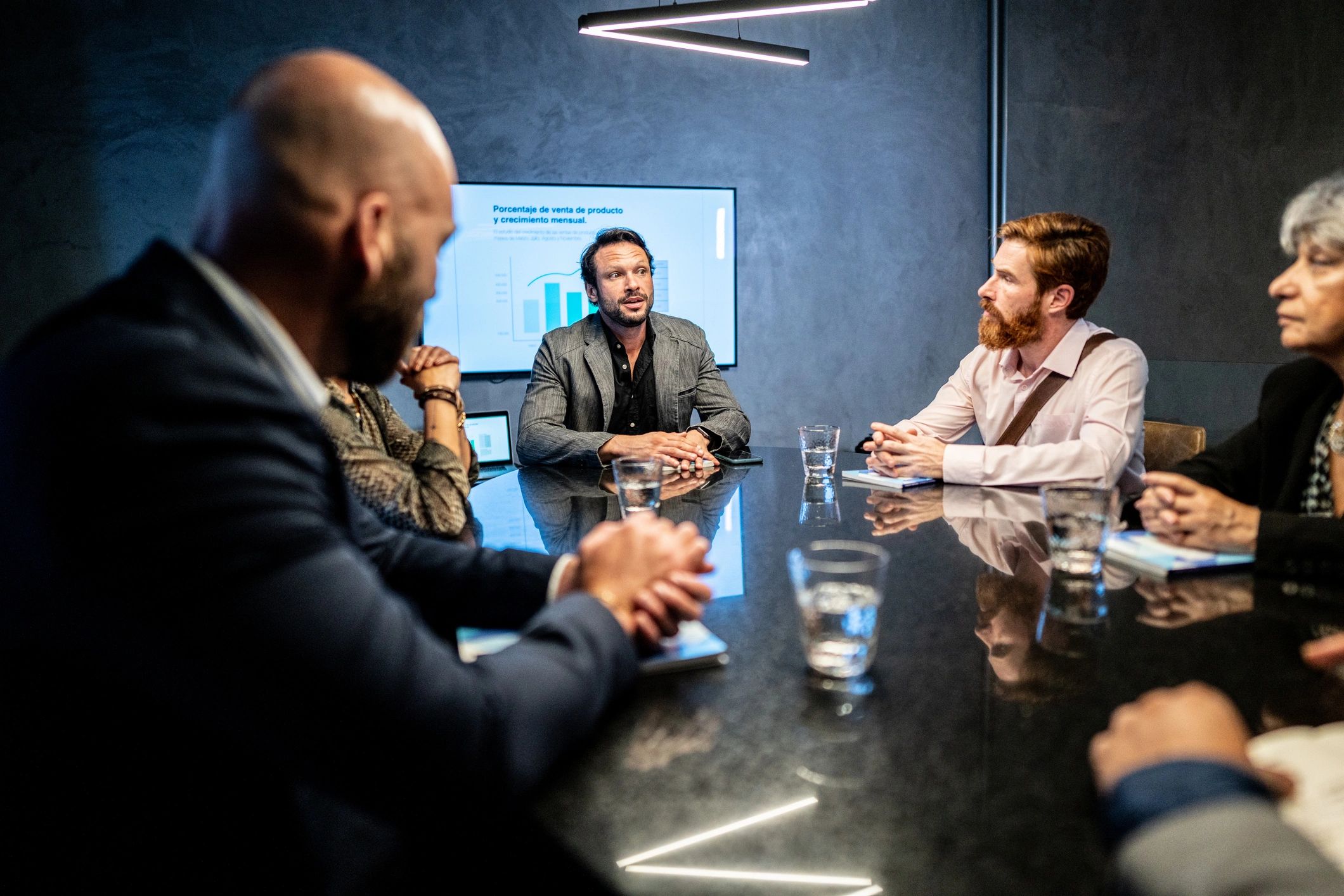 Advisor speaking during a meeting
