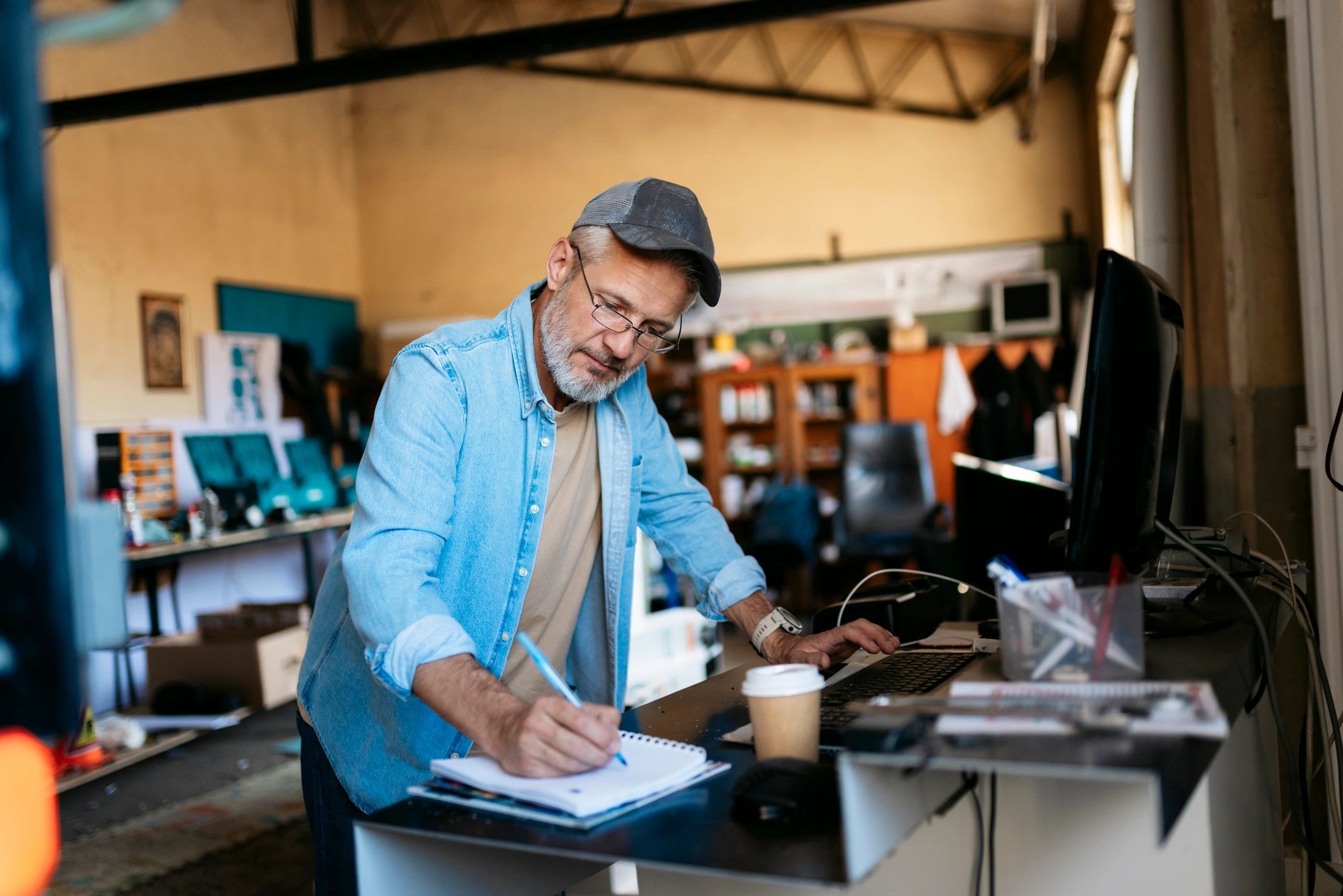 Small business owner working, representing small business investing