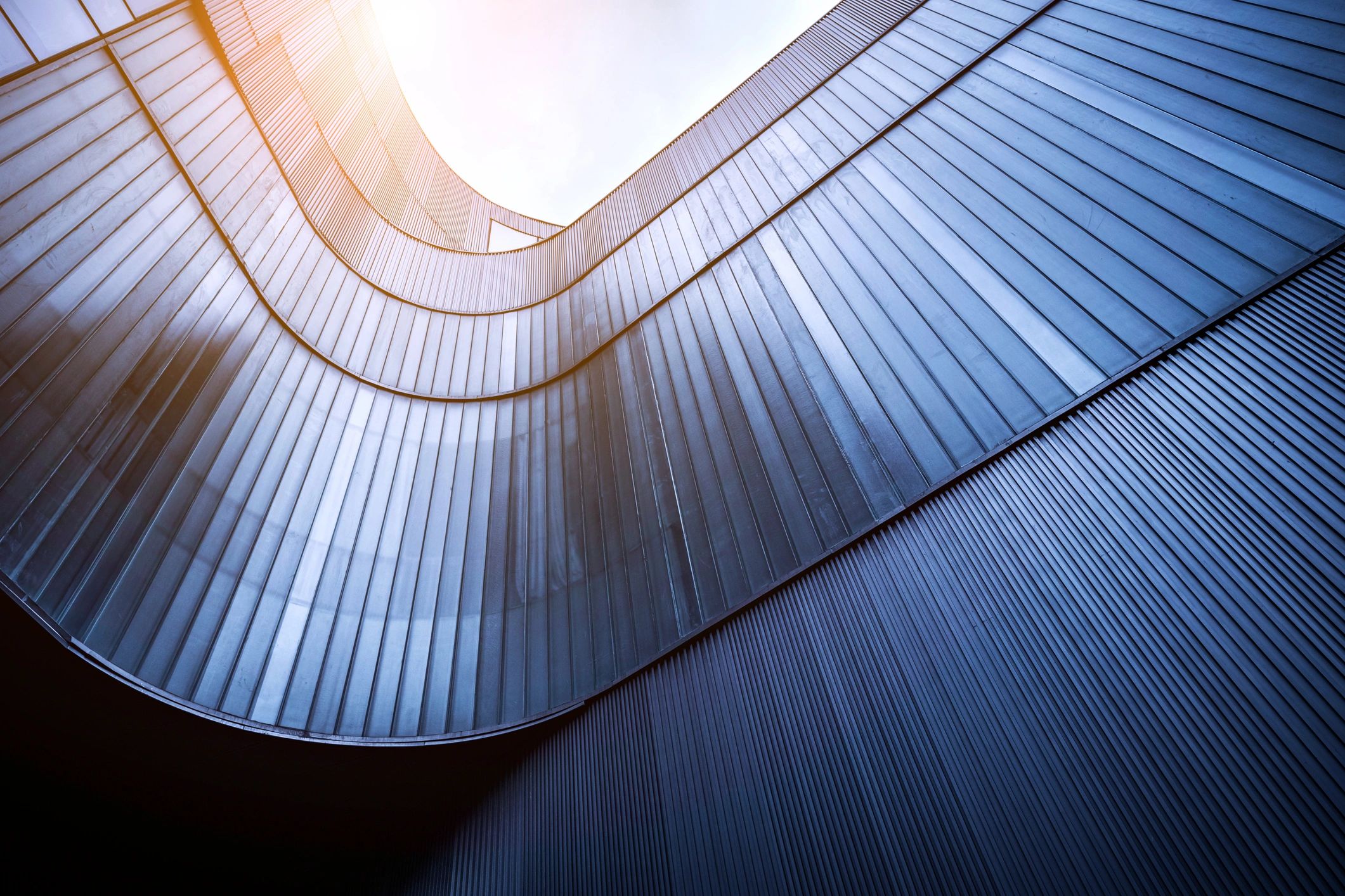 Modern building exterior representing real estate investing